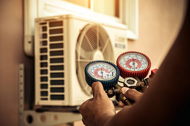 Professional Hvac Maintenance technician working in Marstons Mills, MA